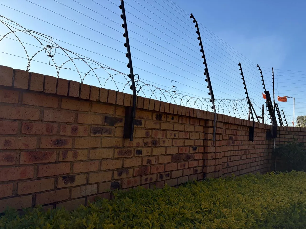 Electric fence installed along boundary wall